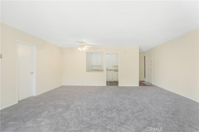 8421 Lindley Ave, Northridge, CA 91325 - spare room featuring a ceiling fan and carpet floors