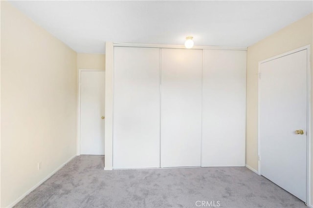 8421 Lindley Ave, Northridge, CA 91325 - unfurnished bedroom with carpet floors and a closet