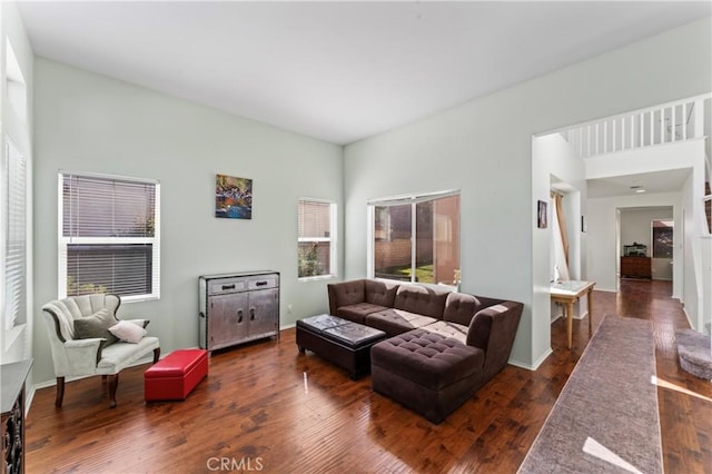 living room with dark wood-type flooring