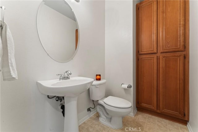 bathroom featuring toilet