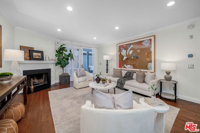 living room with dark hardwood / wood-style floors and ornamental molding