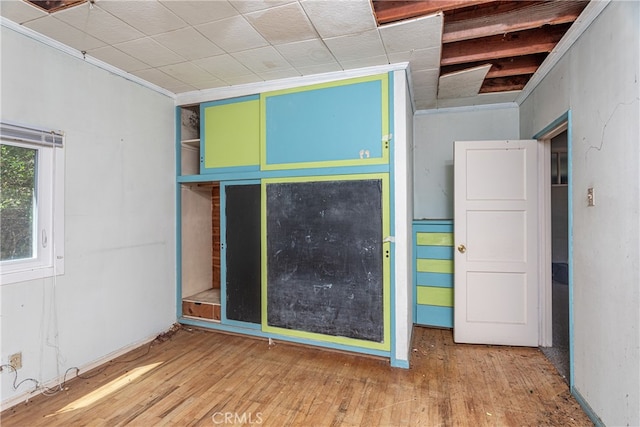 spare room featuring hardwood / wood-style floors