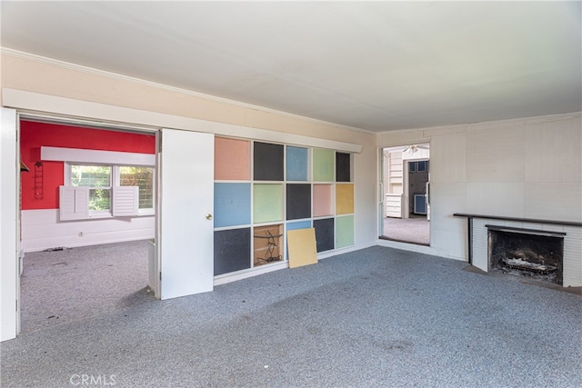 unfurnished living room featuring a fireplace