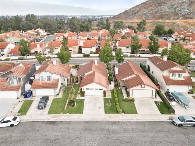 drone / aerial view featuring a mountain view