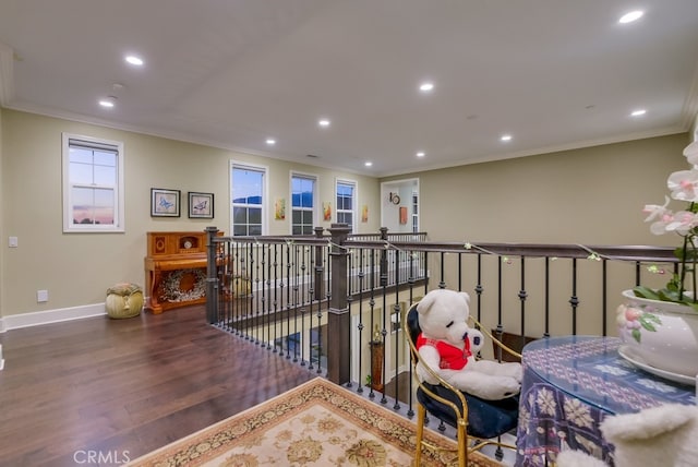 hall with crown molding and dark wood-type flooring