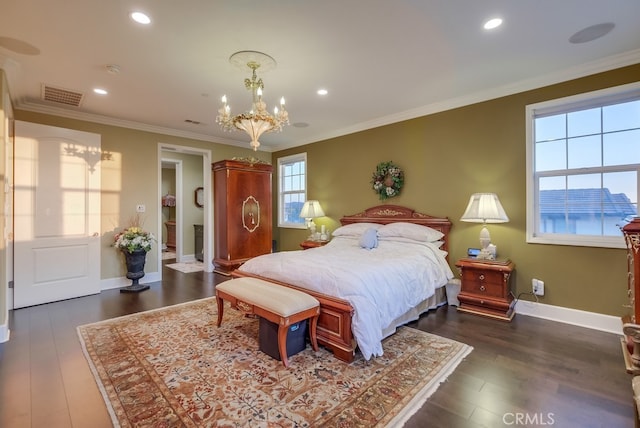 bedroom with a chandelier, dark hardwood / wood-style floors, and ornamental molding