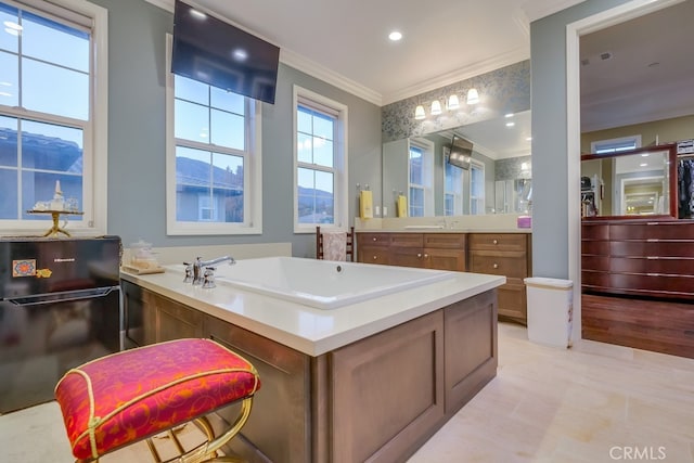 bathroom with a mountain view, vanity, and ornamental molding