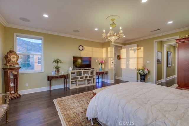 bedroom featuring ornamental molding, dark wood-type flooring, and an inviting chandelier