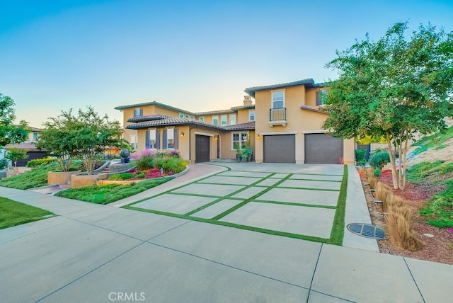 view of front of property with a garage