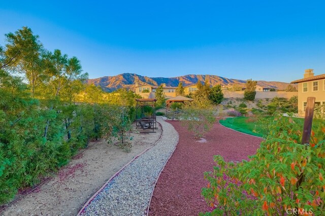 surrounding community featuring a mountain view