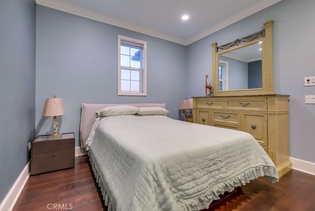 bedroom featuring dark hardwood / wood-style flooring and ornamental molding