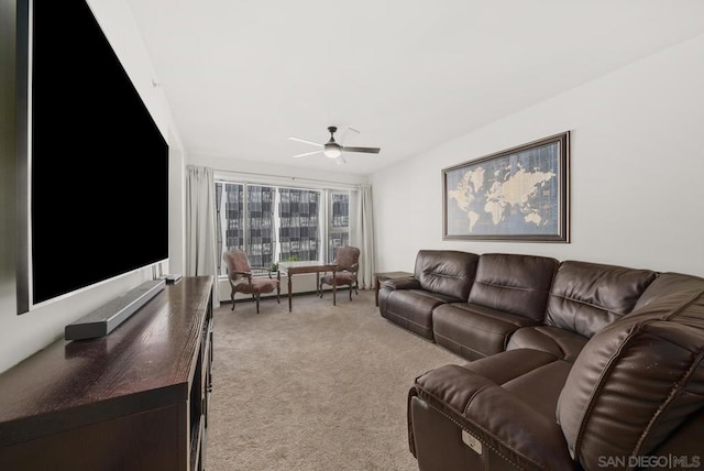 living room with ceiling fan and light carpet