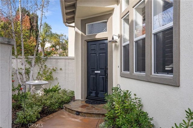 7 Corte Abertura, San Clemente, CA 92673 - doorway to property featuring stucco siding