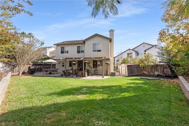 7 Corte Abertura, San Clemente, CA 92673 - rear view of house with a storage unit, a fenced backyard, a patio area, and stucco siding