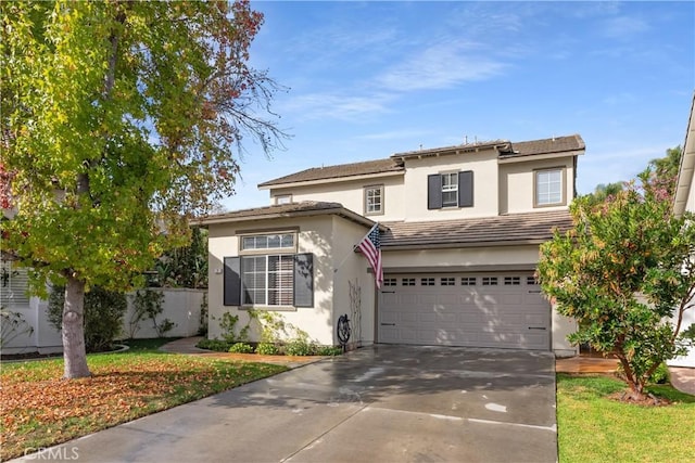 7 Corte Abertura, San Clemente, CA 92673 - view of front of house with an attached garage, concrete driveway, and stucco siding