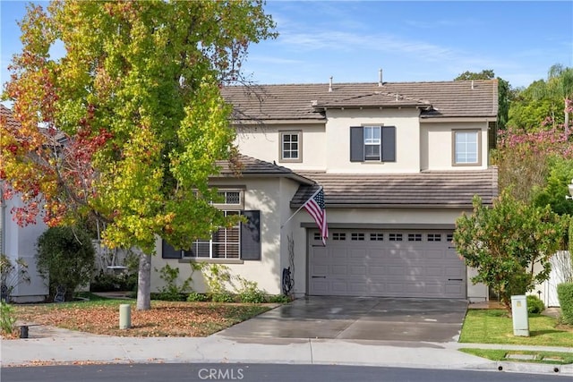 front of property featuring a garage