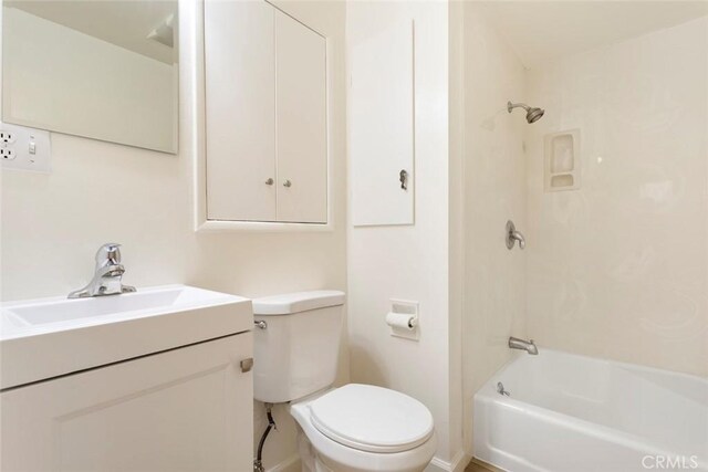 full bathroom featuring vanity, toilet, and shower / bath combination