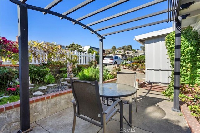 view of patio featuring a pergola