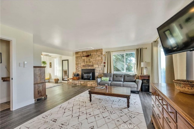 living room featuring a fireplace and hardwood / wood-style floors