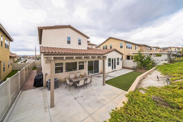 back of house featuring a patio area