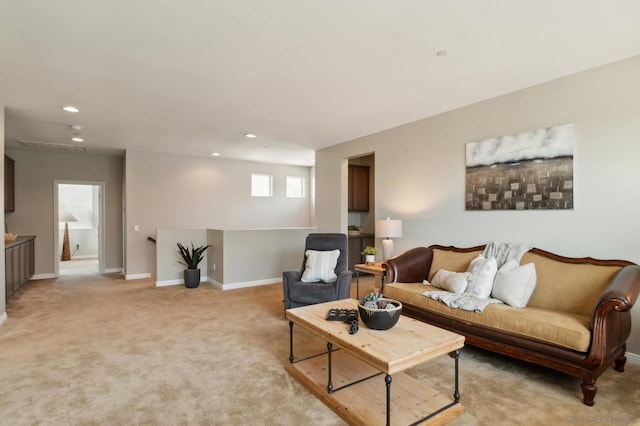 carpeted living room with a wealth of natural light