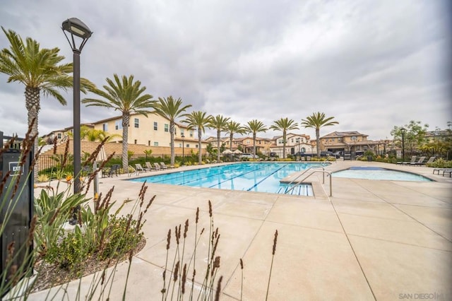 view of swimming pool featuring a patio