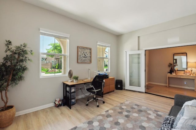 home office with light wood-type flooring