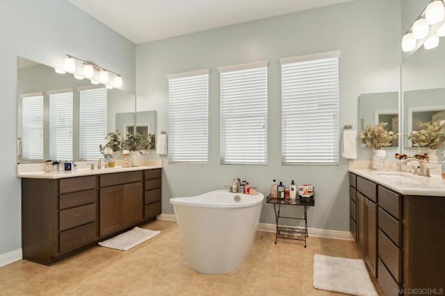 bathroom with vanity and a bathing tub