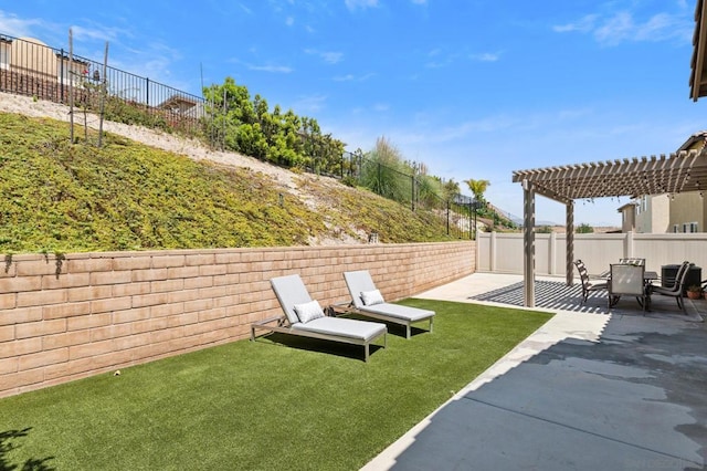 view of yard featuring a patio area and a pergola