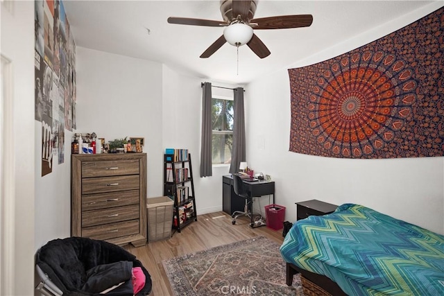 bedroom featuring ceiling fan and light hardwood / wood-style floors