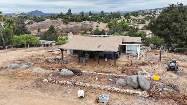 exterior space featuring a mountain view