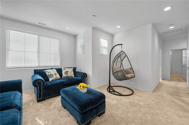 living room with light colored carpet