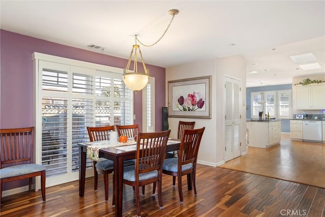 dining area featuring hardwood / wood-style floors