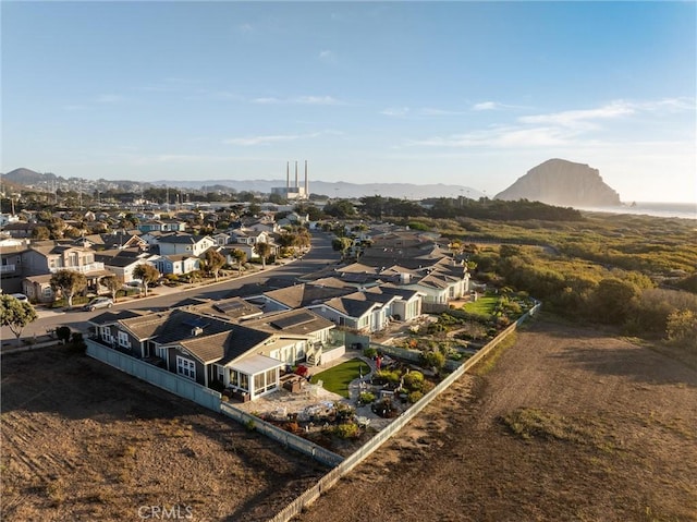 birds eye view of property featuring a mountain view