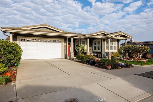 view of front of property with a garage