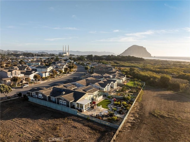 drone / aerial view featuring a mountain view