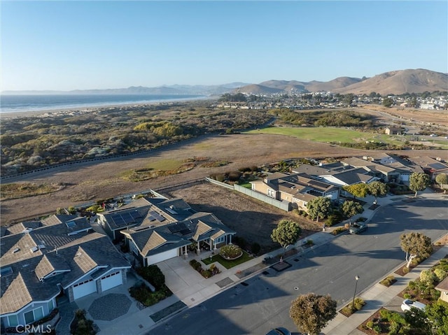 aerial view with a water and mountain view