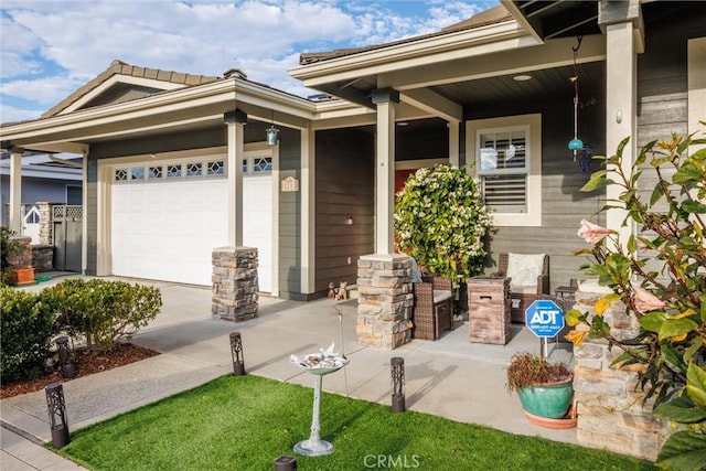 doorway to property featuring a garage