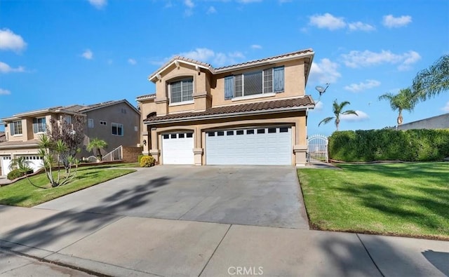 view of front of home with a garage and a front yard