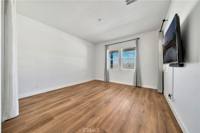 interior space with hardwood / wood-style floors