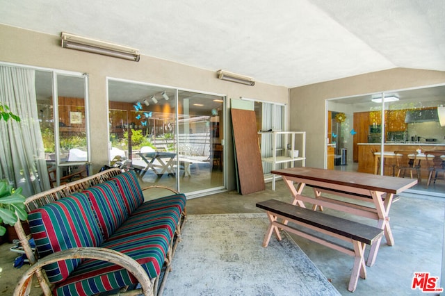 sunroom with lofted ceiling