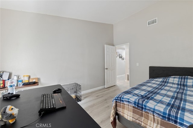 bedroom featuring light hardwood / wood-style floors