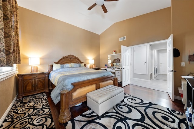 bedroom featuring vaulted ceiling, ceiling fan, and dark wood-type flooring