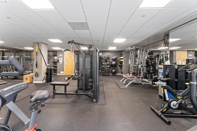 gym featuring a drop ceiling