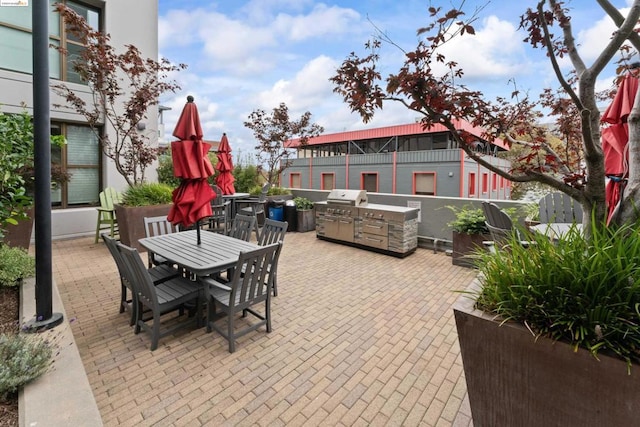 view of patio / terrace featuring area for grilling and an outdoor kitchen