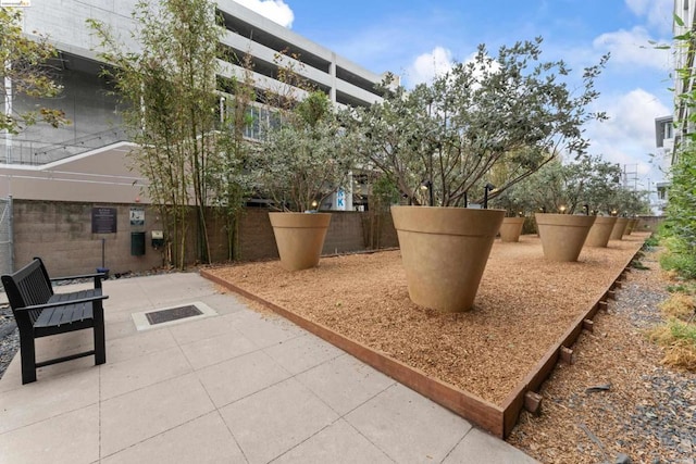 view of property's community featuring a patio