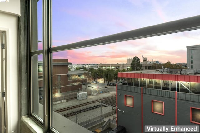 view of balcony at dusk