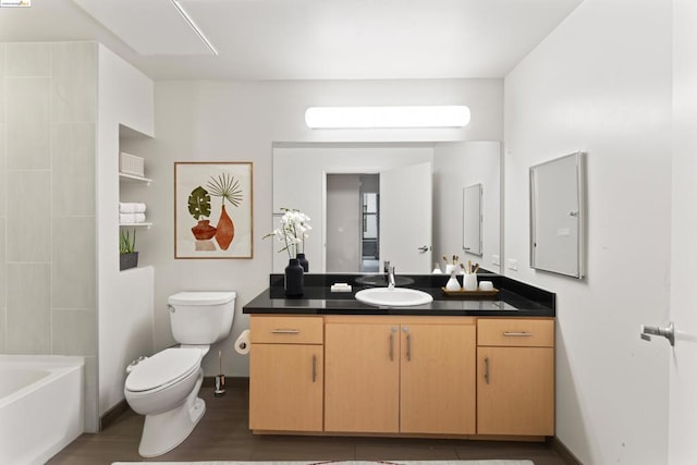 full bathroom with tile patterned floors, vanity, toilet, and washtub / shower combination