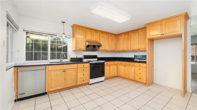 kitchen with sink, range hood, pendant lighting, light tile patterned floors, and appliances with stainless steel finishes