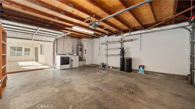 garage with secured water heater, washing machine and dryer, and a garage door opener